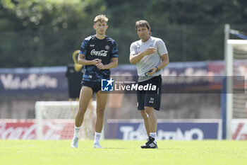 2024-07-15 - Napoli’s Italian coach Antonio Conte and Napoli's Danish midfielder Jesper Lindstrom during SSC Napoli's 2024-25 preseason training camp in val di sole in Trentino, Dimaro Folgarida

 - SSC NAPOLI TRAINING - OTHER - SOCCER