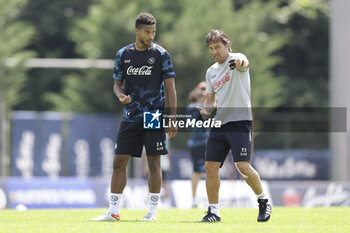 2024-07-15 - Napoli's Swedish midfielder Jens Cajuste and Napoli’s Italian coach Antonio Conte during SSC Napoli's 2024-25 preseason training camp in val di sole in Trentino, Dimaro Folgarida

 - SSC NAPOLI TRAINING - OTHER - SOCCER