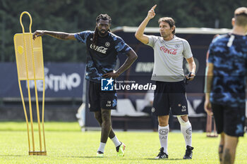 2024-07-18 - Napoli’s Cameroonian midfielder Andre Frank Zambo Anguissa and Napoli’s Italian coach Antonio Conte during SSC Napoli's 2024-25 preseason training camp in val di sole in Trentino, Dimaro Folgarida

 - SSC NAPOLI TRAINING - OTHER - SOCCER