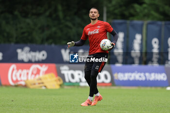 2024-07-19 - Napoli's Italian goalkeeper Elia Caprile controls the ball during SSC Napoli's 2024-25 preseason training camp in val di sole in Trentino, Dimaro Folgarida

 - SSC NAPOLI TRAINING - OTHER - SOCCER