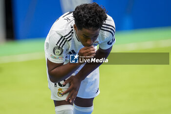 2024-07-27 - Endrick Felipe Moreira de Sousa poses for photos with Real Madrid jersey during his presentation at Estadio Santiago Bernabeu on July 27, 2024 in Madrid, Spain. - REAL MADRID UNVEILS NEW SIGNING ENDRICK - OTHER - SOCCER