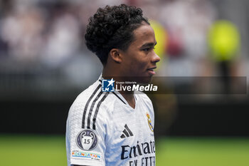 2024-07-27 - Endrick Felipe Moreira de Sousa with Real Madrid jersey seen smiling during his presentation at Estadio Santiago Bernabeu on July 27, 2024 in Madrid, Spain. - REAL MADRID UNVEILS NEW SIGNING ENDRICK - OTHER - SOCCER