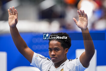 2024-07-27 - Endrick Felipe Moreira de Sousa poses for photos with Real Madrid jersey during his presentation at Estadio Santiago Bernabeu on July 27, 2024 in Madrid, Spain. - REAL MADRID UNVEILS NEW SIGNING ENDRICK - OTHER - SOCCER