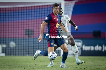 2024-08-12 - Robert Lewandowski (FC Barcelona) controls the ball during a Joan Gamper Trophy at Estadi Olimpic Lluis Companys in Barcelona, Spain, on August 12 2024. Photo by Felipe Mondino - TROFEU JOAN GAMPER: FC BARCELONA - AS MONACO - OTHER - SOCCER