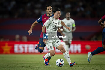 2024-08-12 - Takumi Minamino (AS Monaco) controls the ball during a Joan Gamper Trophy at Estadi Olimpic Lluis Companys in Barcelona, Spain, on August 12 2024. Photo by Felipe Mondino - TROFEU JOAN GAMPER: FC BARCELONA - AS MONACO - OTHER - SOCCER