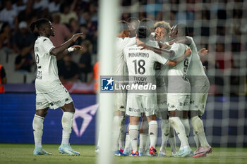 2024-08-12 - Takumi Minamino (AS Monaco) celebrates after scoring his team's goal with team mates during a Joan Gamper Trophy at Estadi Olimpic Lluis Companys in Barcelona, Spain, on August 12 2024. Photo by Felipe Mondino - TROFEU JOAN GAMPER: FC BARCELONA - AS MONACO - OTHER - SOCCER