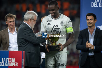 2024-08-12 - Denis Zakaria (AS Monaco) with the Joan Gamper Trophy during a Joan Gamper Trophy at Estadi Olimpic Lluis Companys in Barcelona, Spain, on August 12 2024. Photo by Felipe Mondino - TROFEU JOAN GAMPER: FC BARCELONA - AS MONACO - OTHER - SOCCER