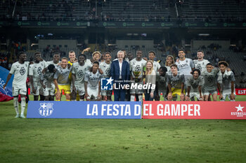 2024-08-12 - AS Monaco players and Dmitry Rybolovlev (AS Monaco president) smiles with the Joan Gamper Trophy at Estadi Olimpic Lluis Companys in Barcelona, Spain, on August 12 2024. Photo by Felipe Mondino - TROFEU JOAN GAMPER: FC BARCELONA - AS MONACO - OTHER - SOCCER