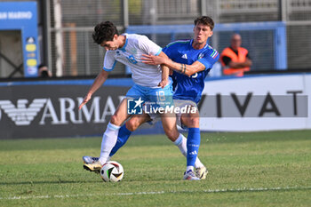 2024-09-05 - Nicolo Sancisi (SMR) and Nicolo Savona (ITA) during the UEFA U21 Euro 2025 Qualifier match between Italy and San Marino at the Domenico Francioni Stadium on September 5, 2024 in Latina, Italy. - UEFA UNDER 21 - ITALY VS SAN MARINO - OTHER - SOCCER