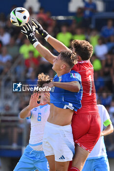 2024-09-05 - Pio Esposito (ITA) and Pietro Amici (SMR) during the UEFA U21 Euro 2025 Qualifier match between Italy and San Marino at the Domenico Francioni Stadium on September 5, 2024 in Latina, Italy. - UEFA UNDER 21 - ITALY VS SAN MARINO - OTHER - SOCCER