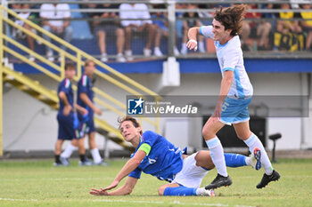 2024-09-05 - Edoardo Bove (ITA) and Giacomo Matteoni (SMR) during the UEFA U21 Euro 2025 Qualifier match between Italy and San Marino at the Domenico Francioni Stadium on September 5, 2024 in Latina, Italy. - UEFA UNDER 21 - ITALY VS SAN MARINO - OTHER - SOCCER