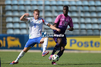 2024-09-10 - Italia's U20 Pietro Comuzzo in action against Germany's U20 Ilyas Ansah during the match Elite League Italy U20 - Germany U20 at the 