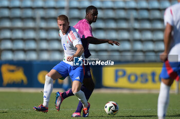 2024-09-10 - Italia's U20 Pietro Comuzzo in action against Germany's U20 Ilyas Ansah during the match Elite League Italy U20 - Germany U20 at the 