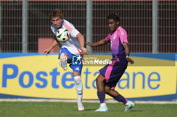 2024-09-10 - Italia's U20 Luca Di Maggio in action against Germany's U20 Justin Diehl during the match Elite League Italy U20 - Germany U20 at the 