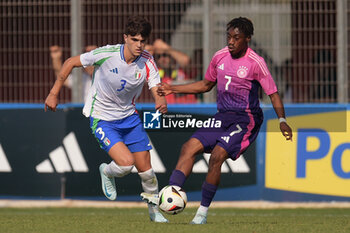 2024-09-10 - Italia's U20 Davide Bartesaghi in action against Germany's U20 Justin Diehl during the match Elite League Italy U20 - Germany U20 at the 