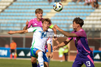 2024-09-10 - Italia's U20 Luca Di Maggio in action against Germany's U20 Aaron Zehnter during the match Elite League Italy U20 - Germany U20 at the 