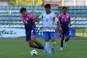 2024-09-10 - Italia's U20 Dominic Vavassori in action against Germany's U20 Julian Pauli during the match Elite League Italy U20 - Germany U20 at the 