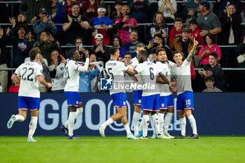 2024-11-18 - Teammates celebrate with forward Christian Pulisic (10) after a 13th minute goal - CONCACAF NATIONS LEAGUE - USA VS JAMAICA - OTHER - SOCCER