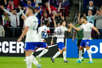 2024-11-18 - United States forward Christian Pulisic (10) celebrates with midfielder Tanner Tessmann (18) after Pulisic’s second goal of the night - CONCACAF NATIONS LEAGUE - USA VS JAMAICA - OTHER - SOCCER