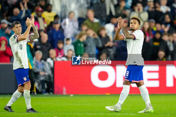 2024-11-18 - United States forward Christian Pulisic (10) and midfielder Weston McKennie (8) applaud the crowd as they exit in the second half - CONCACAF NATIONS LEAGUE - USA VS JAMAICA - OTHER - SOCCER