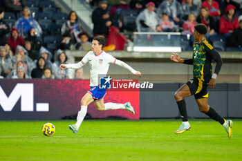 2024-11-18 - United States midfielder Brenden Aaronson (11) moves the ball against Jamaica defender Richard King (5) - CONCACAF NATIONS LEAGUE - USA VS JAMAICA - OTHER - SOCCER