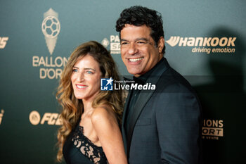 2024-10-28 - Rai and his wife Cristina Bellissimo during the red carpet ceremony of the Ballon d'Or (Golden Ball) France Football 2024 on 28 October 2024 at Theatre du Chatelet in Paris, France - FOOTBALL - BALLON D'OR 2024 - RED CARPET CEREMONY - OTHER - SOCCER