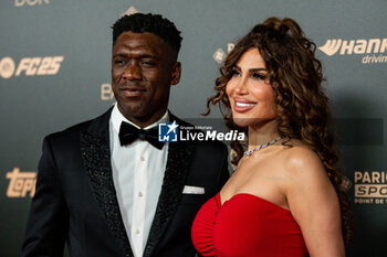 2024-10-28 - Clarence Seedorf and his wife Sophia Makramati during the red carpet ceremony of the Ballon d'Or (Golden Ball) France Football 2024 on 28 October 2024 at Theatre du Chatelet in Paris, France - FOOTBALL - BALLON D'OR 2024 - RED CARPET CEREMONY - OTHER - SOCCER