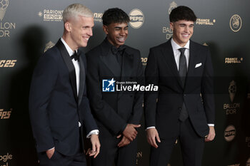 2024-10-28 - Dani Olmo, Lamine Yamal and Pau Cubarsi of Spain and FC Barcelona attend the 68th Ballon D'Or France Football 2024 photocall on October 28, 2024 at Theatre du Chatelet in Paris, France - FOOTBALL - BALLON D'OR 2024 - OTHER - SOCCER