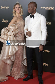 2024-10-28 - Didier Drogba and Sandy Heribert attend the 68th Ballon D'Or France Football 2024 photocall on October 28, 2024 at Theatre du Chatelet in Paris, France - FOOTBALL - BALLON D'OR 2024 - OTHER - SOCCER