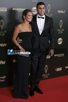 2024-10-28 - Rodrigo Hernandez Cascante aka Rodri of Manchester City and Laura Iglesias attend the 68th Ballon D'Or France Football 2024 photocall on October 28, 2024 at Theatre du Chatelet in Paris, France - FOOTBALL - BALLON D'OR 2024 - OTHER - SOCCER