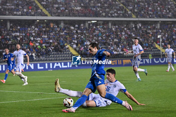 2024-06-09 - Italy's forward Federico Chiesa against Bosnia and Herzegovina's defender Anel Ahmedhodzic - ITALY VS BOSNIA - FRIENDLY MATCH - SOCCER