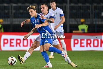 2024-06-09 - Italy's midfielder Nicolo Fagioli against Bosnia and Herzegovina's midfielder Dario Saric - ITALY VS BOSNIA - FRIENDLY MATCH - SOCCER