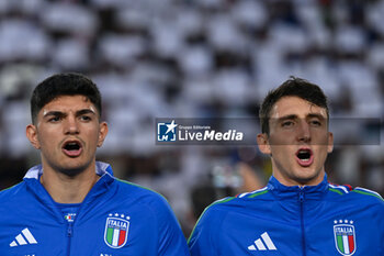 2024-06-09 - Italy's defender Raoul Bellanova and Italy's defender Andrea Cambiaso during the anthem - ITALY VS BOSNIA - FRIENDLY MATCH - SOCCER