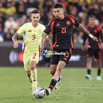 2024-03-22 - Daniel Munoz of Colombia and Alex Grimaldo of Spain during the International Friendly football match between Spain and Colombia on 22 March 2024 at the London Stadium in London, England - FOOTBALL - FRIENDLY GAME - SPAIN V COLOMBIA - FRIENDLY MATCH - SOCCER