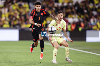 2024-03-22 - Luis Diaz of Colombia and Pablo Sarabia of Spain during the International Friendly football match between Spain and Colombia on 22 March 2024 at the London Stadium in London, England - FOOTBALL - FRIENDLY GAME - SPAIN V COLOMBIA - FRIENDLY MATCH - SOCCER