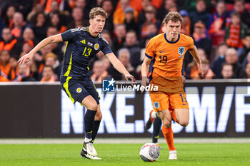 2024-03-22 - Jack Hendry of Scotland, Mats Wieffer of Netherlands during the International Friendly football match between Netherlands and Scotland on March 22, 2024 at Johan Cruijff ArenA in Amsterdam, Netherlands - FOOTBALL - FRIENDLY GAME - NETHERLANDS V SCOTLAND - FRIENDLY MATCH - SOCCER