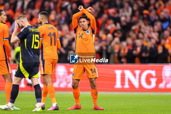 2024-03-22 - Tijjani Reijnders of Netherlands celebrates the first goal during the International Friendly football match between Netherlands and Scotland on March 22, 2024 at Johan Cruijff ArenA in Amsterdam, Netherlands - FOOTBALL - FRIENDLY GAME - NETHERLANDS V SCOTLAND - FRIENDLY MATCH - SOCCER