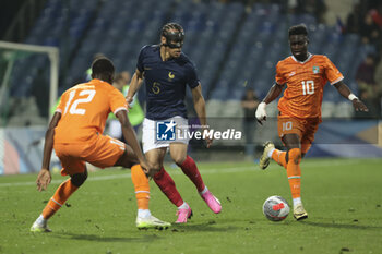 2024-03-22 - Kiliann Sildillia of France, Abdoulaye Traore of Ivory Coast during the International Under 23 Friendly football match between France U23 and Ivory Coast U23 on March 22, 2024 at Stade Gaston Petit in Chateauroux, France - FOOTBALL - U23 FRIENDLY GAME - FRANCE V IVORY COAST - FRIENDLY MATCH - SOCCER