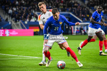 2024-03-23 - Lucas HERNANDEZ of France and Joshua KIMMICH of Germany during the International Friendly football match between France and Germany on March 23, 2024 at Groupama stadium in Decines-Charpieu near Lyon, France - FOOTBALL - FRIENDLY GAME - FRANCE V GERMANY - FRIENDLY MATCH - SOCCER