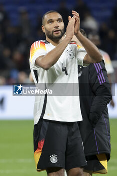2024-03-23 - Jonathan Tah of Germany salutes the supporters following the International Friendly football match between France and Germany on March 23, 2024 at Groupama stadium in Decines-Charpieu near Lyon, France - FOOTBALL - FRIENDLY GAME - FRANCE V GERMANY - FRIENDLY MATCH - SOCCER