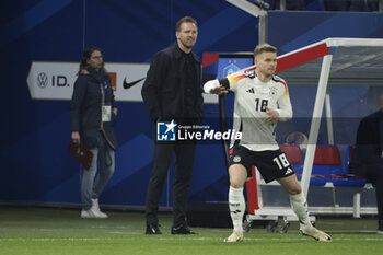 2024-03-23 - Coach of Germany Julian Nagelsmann, Maximilian Mittelstadt of Germany during the International Friendly football match between France and Germany on March 23, 2024 at Groupama stadium in Decines-Charpieu near Lyon, France - FOOTBALL - FRIENDLY GAME - FRANCE V GERMANY - FRIENDLY MATCH - SOCCER