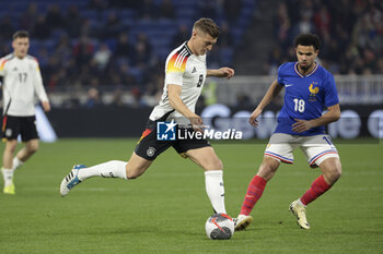 2024-03-23 - Toni Kroos of Germany, Warren Zaire-Emery of France during the International Friendly football match between France and Germany on March 23, 2024 at Groupama stadium in Decines-Charpieu near Lyon, France - FOOTBALL - FRIENDLY GAME - FRANCE V GERMANY - FRIENDLY MATCH - SOCCER