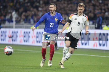 2024-03-23 - Lucas Hernandez of France, Joshua Kimmich of Germany during the International Friendly football match between France and Germany on March 23, 2024 at Groupama stadium in Decines-Charpieu near Lyon, France - FOOTBALL - FRIENDLY GAME - FRANCE V GERMANY - FRIENDLY MATCH - SOCCER