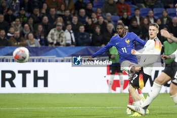 2024-03-23 - Ousmane Dembele of France, Florian Wirtz of Germany during the International Friendly football match between France and Germany on March 23, 2024 at Groupama stadium in Decines-Charpieu near Lyon, France - FOOTBALL - FRIENDLY GAME - FRANCE V GERMANY - FRIENDLY MATCH - SOCCER
