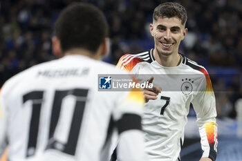 2024-03-23 - Kai Havertz of Germany celebrates his goal with Jamal Musiala of Germany #10 during the International Friendly football match between France and Germany on March 23, 2024 at Groupama stadium in Decines-Charpieu near Lyon, France - FOOTBALL - FRIENDLY GAME - FRANCE V GERMANY - FRIENDLY MATCH - SOCCER