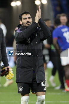 2024-03-23 - Ilkay Gundogan of Germany salutes the supporters following the International Friendly football match between France and Germany on March 23, 2024 at Groupama stadium in Decines-Charpieu near Lyon, France - FOOTBALL - FRIENDLY GAME - FRANCE V GERMANY - FRIENDLY MATCH - SOCCER
