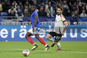 2024-03-23 - Dayot Upamecano of France, Ilkay Gundogan of Germany during the International Friendly football match between France and Germany on March 23, 2024 at Groupama stadium in Decines-Charpieu near Lyon, France - FOOTBALL - FRIENDLY GAME - FRANCE V GERMANY - FRIENDLY MATCH - SOCCER