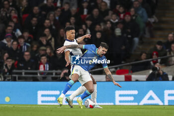 2024-03-23 - Brazil midfielder Bruno Guimaraes and England Forward Ollie Watkins during the International Friendly football match between England and Brazil on 23 March 2024 at Wembley Stadium in London, England - FOOTBALL - FRIENDLY GAME - ENGLAND V BRAZIL - FRIENDLY MATCH - SOCCER