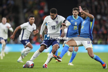 2024-03-23 - Jude Bellingham of England and Fabricio Bruno of Brazil during the International Friendly football match between England and Brazil on 23 March 2024 at Wembley Stadium in London, England - FOOTBALL - FRIENDLY GAME - ENGLAND V BRAZIL - FRIENDLY MATCH - SOCCER