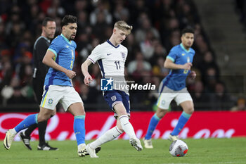 2024-03-23 - England Forward Anthony Gordon and Brazil midfielder Lucas Paqueta during the International Friendly football match between England and Brazil on 23 March 2024 at Wembley Stadium in London, England - FOOTBALL - FRIENDLY GAME - ENGLAND V BRAZIL - FRIENDLY MATCH - SOCCER